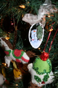 Assorted felt and painted ornaments