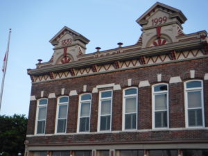 red brick building with arched windows